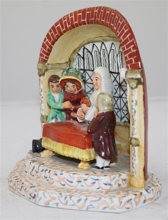 A Staffordshire The New Marriage Act pottery group, c.1840, 15cm